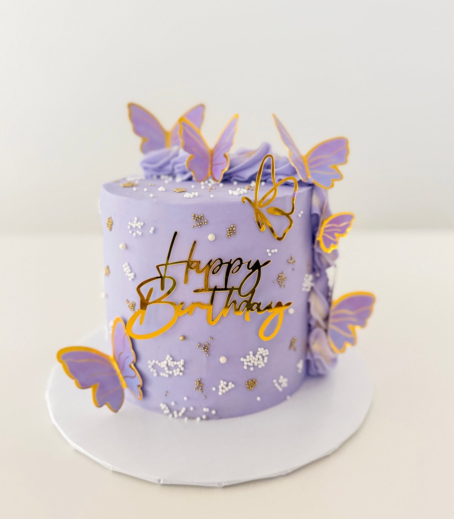 Pink, purple butterfly birthday cake with buttercream frosting – Fresno bakery custom cake.
Elegant butterfly cake with pastel colors and floral details in Fresno California.
Custom birthday butterfly cake for girls with soft pink and purple design.”
luxury butterfly cake with edible butterflies and smooth buttercream finish Fresno CA/ Purple cake.
Fresno butterfly cake for birthday.