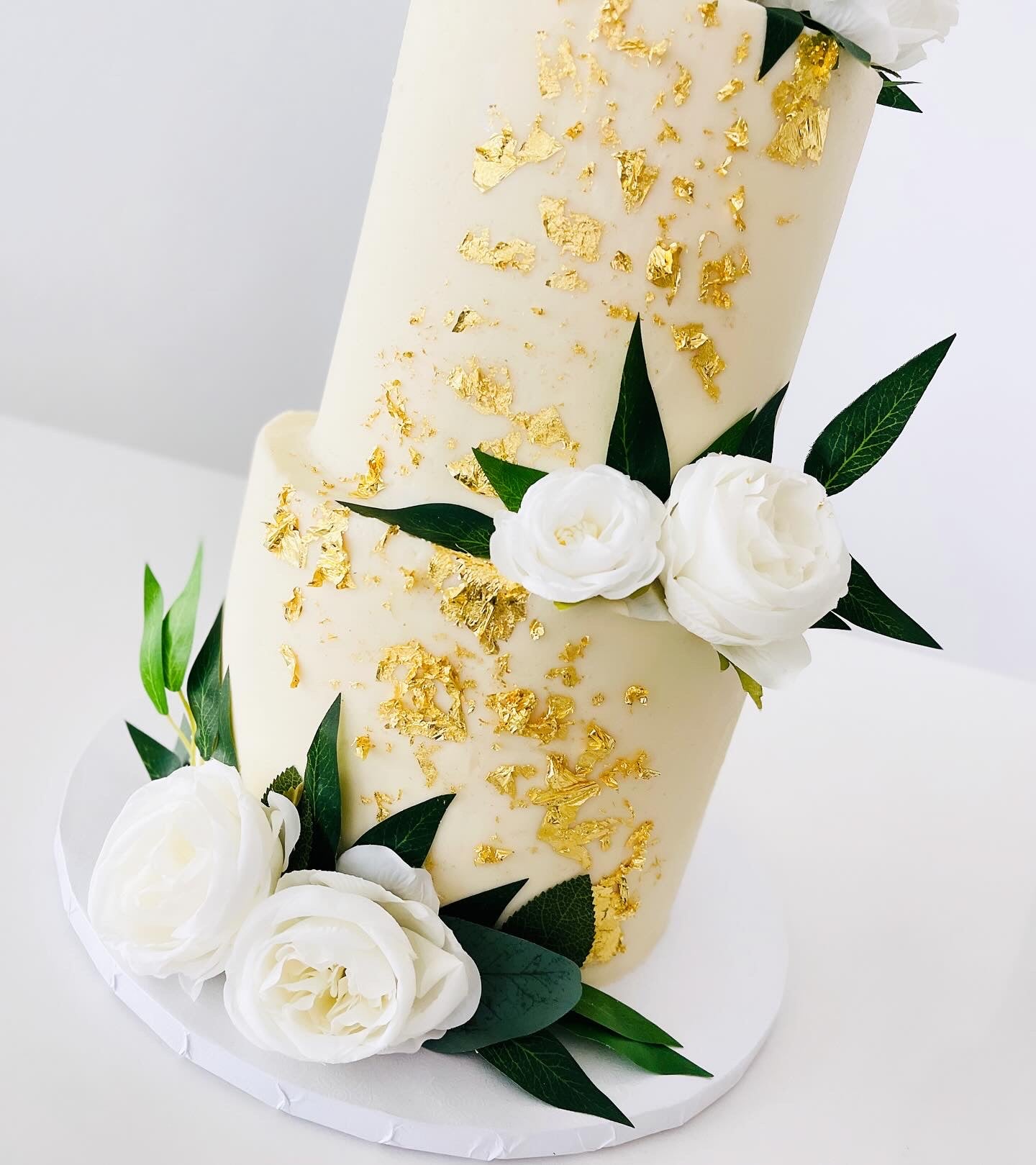 Two Tier White And Gold Floral Wedding Cake