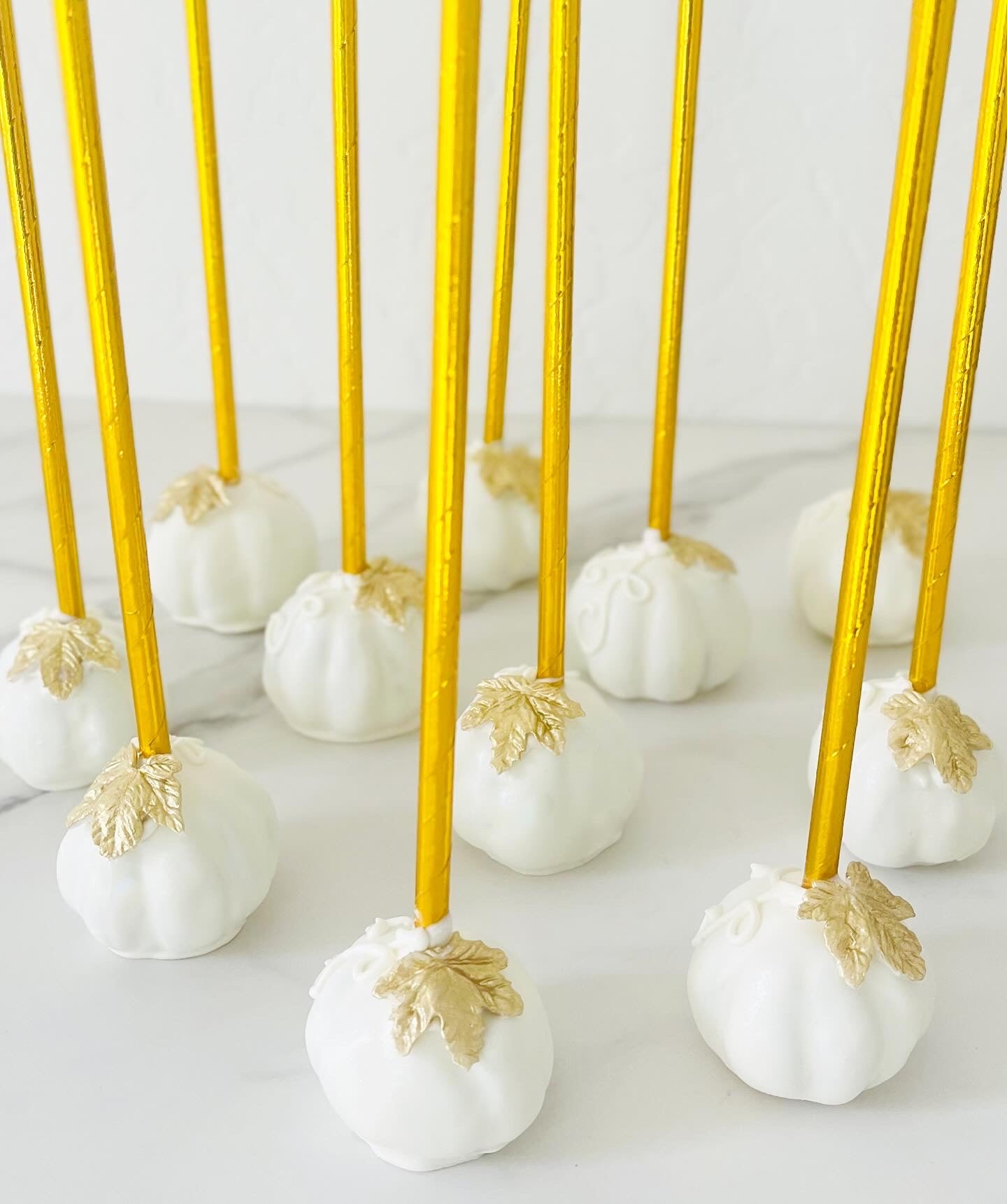 White And Gold Pumpkin Cake Pops
