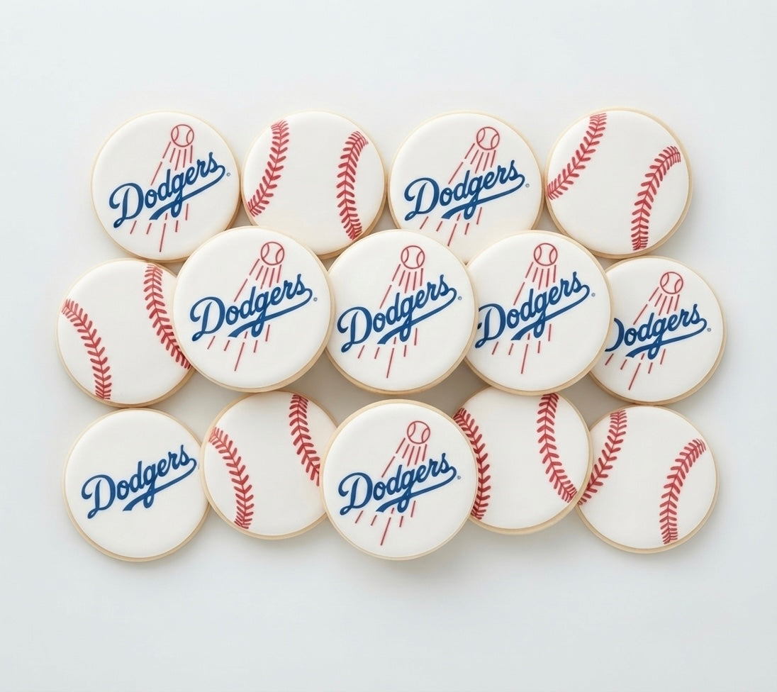 12 handmade Dodgers-themed cookies decorated with baseball designs, perfect for Dodgers fans, birthdays, game days, and sports celebrations.

Dodgers baseball cookies 12 count with custom team-inspired decorations for parties and celebrations.
Hand decorated Dodgers cookies for baseball fans, birthdays, game-day parties, and special events.
Custom Dodgers-themed sugar cookies with baseball designs, perfect for sports parties and gifts.
12 decorated Dodgers cookies arranged for a 