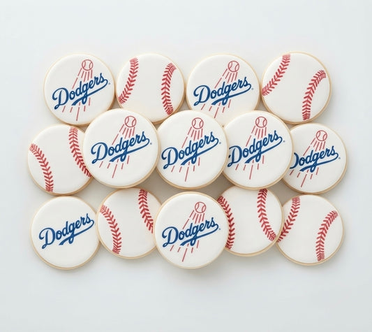 12 handmade Dodgers-themed cookies decorated with baseball designs, perfect for Dodgers fans, birthdays, game days, and sports celebrations.

Dodgers baseball cookies 12 count with custom team-inspired decorations for parties and celebrations.
Hand decorated Dodgers cookies for baseball fans, birthdays, game-day parties, and special events.
Custom Dodgers-themed sugar cookies with baseball designs, perfect for sports parties and gifts.
12 decorated Dodgers cookies arranged for a 