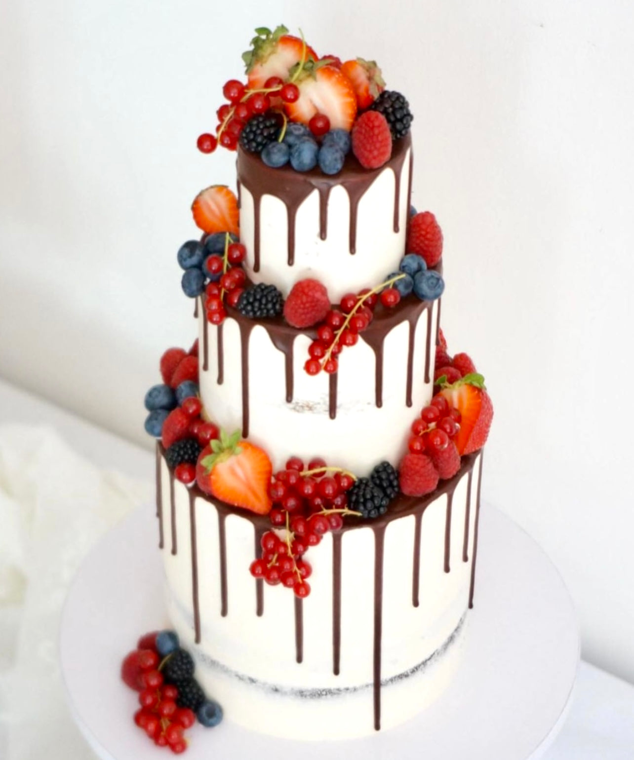 White Wedding Cake With Fruit, Strawberry & Blueberries